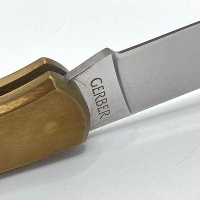 LOT 142: Vintage Gerber Folding Sportsman III Knife with Sheath Item No. 6406 Portland OR in Original Box (New Old Stock)