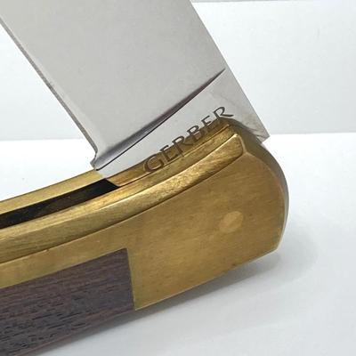 LOT 142: Vintage Gerber Folding Sportsman III Knife with Sheath Item No. 6406 Portland OR in Original Box (New Old Stock)