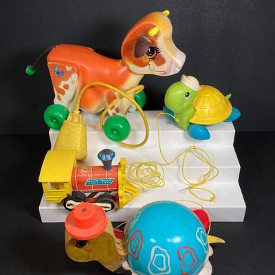 LOT 151: Vintage Fisher Price Toy Collection - Cow, Turtles and Toot Toot Train