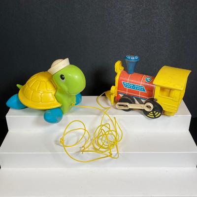 LOT 151: Vintage Fisher Price Toy Collection - Cow, Turtles and Toot Toot Train