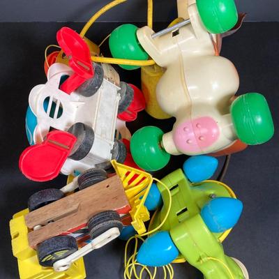 LOT 151: Vintage Fisher Price Toy Collection - Cow, Turtles and Toot Toot Train