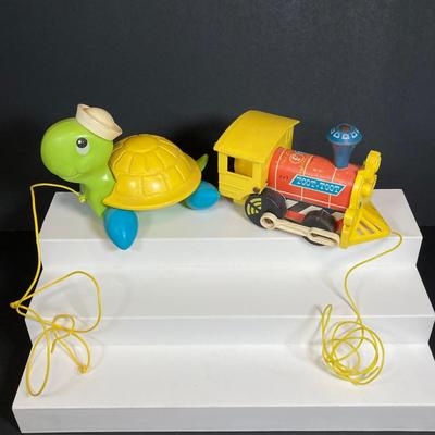 LOT 151: Vintage Fisher Price Toy Collection - Cow, Turtles and Toot Toot Train