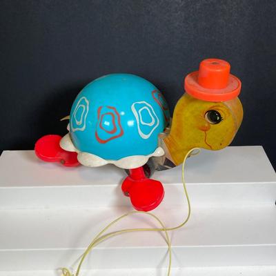 LOT 151: Vintage Fisher Price Toy Collection - Cow, Turtles and Toot Toot Train