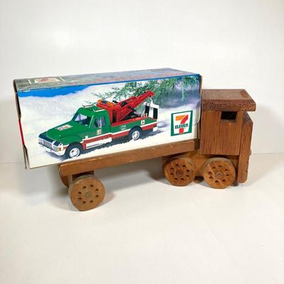 LOT 154: Cool Toy Truck Collection - Jada Toys Tow Truck, 1998 7-Eleven Collectible Toy Wrecker and Wooden Flat Bed Tractor / Trailer