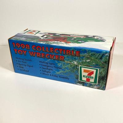 LOT 154: Cool Toy Truck Collection - Jada Toys Tow Truck, 1998 7-Eleven Collectible Toy Wrecker and Wooden Flat Bed Tractor / Trailer