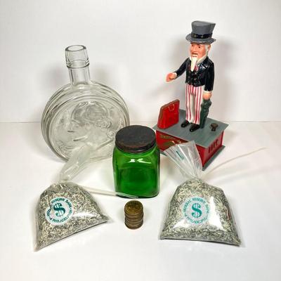 LOT 155: Vintage Uncle Sam Bank, George Washington Clear Glass Bottle, Federal Reserve Bank of Philadelphia Shredded Paper Bills, No Cash...