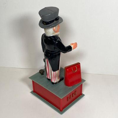 LOT 155: Vintage Uncle Sam Bank, George Washington Clear Glass Bottle, Federal Reserve Bank of Philadelphia Shredded Paper Bills, No Cash...