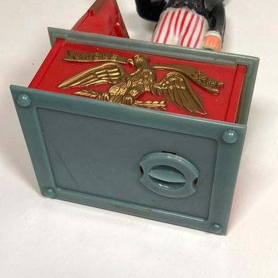 LOT 155: Vintage Uncle Sam Bank, George Washington Clear Glass Bottle, Federal Reserve Bank of Philadelphia Shredded Paper Bills, No Cash...