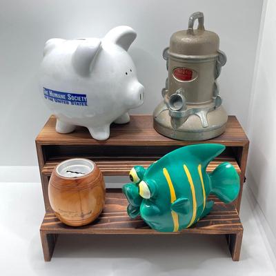 LOT 163: Collection of Coin Banks - Vintage Rexair Vacuum, Humane Society Piggy, Tropical Fish and Souvenir Barrell