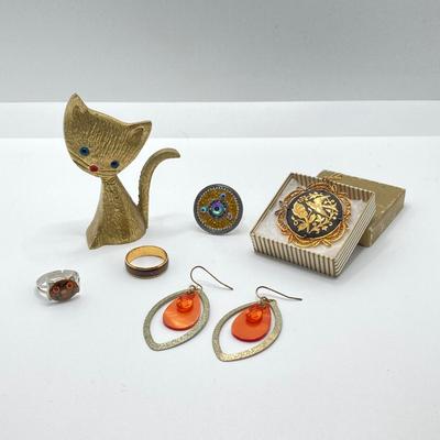 LOT 164: Vintage Jewelry and Ring Holder - Gold Tone Cat Ring Holder, Damascene Pendant, Mood Ring and More