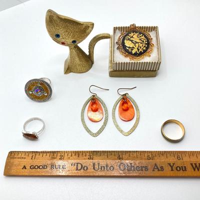 LOT 164: Vintage Jewelry and Ring Holder - Gold Tone Cat Ring Holder, Damascene Pendant, Mood Ring and More