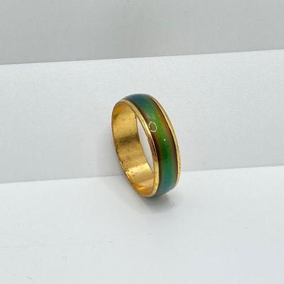 LOT 164: Vintage Jewelry and Ring Holder - Gold Tone Cat Ring Holder, Damascene Pendant, Mood Ring and More