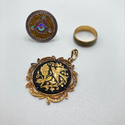 LOT 164: Vintage Jewelry and Ring Holder - Gold Tone Cat Ring Holder, Damascene Pendant, Mood Ring and More