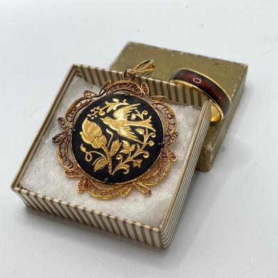 LOT 164: Vintage Jewelry and Ring Holder - Gold Tone Cat Ring Holder, Damascene Pendant, Mood Ring and More