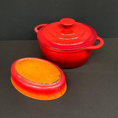 LOT 171: Red Enamel Dutch Oven and Orange / Red Le Creuset Oval Baking Dish