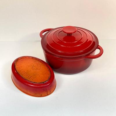 LOT 171: Red Enamel Dutch Oven and Orange / Red Le Creuset Oval Baking Dish