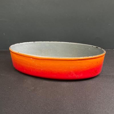 LOT 171: Red Enamel Dutch Oven and Orange / Red Le Creuset Oval Baking Dish