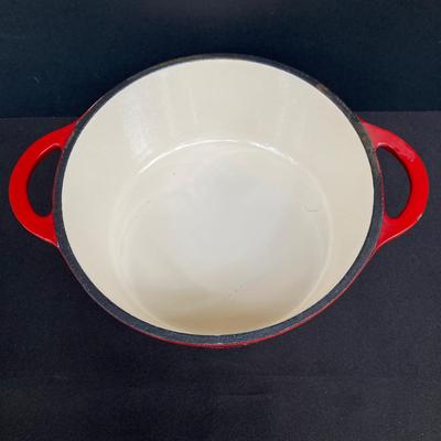 LOT 171: Red Enamel Dutch Oven and Orange / Red Le Creuset Oval Baking Dish