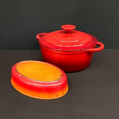 LOT 171: Red Enamel Dutch Oven and Orange / Red Le Creuset Oval Baking Dish