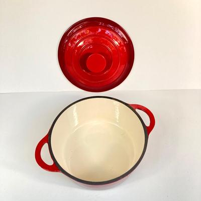 LOT 171: Red Enamel Dutch Oven and Orange / Red Le Creuset Oval Baking Dish