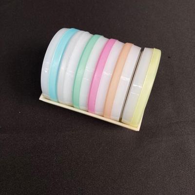 LOT 175: Vintage Tupperware - Egg Holder, Coaster Set, Bowls and Pie Slice Holder