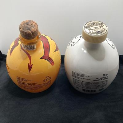 LOT 177: Pair of Kah Tequila Scull Bottles / Decanters, Set of Four Rocks Glasses and Glass Bottle with Wire Bail Swing Top Lid