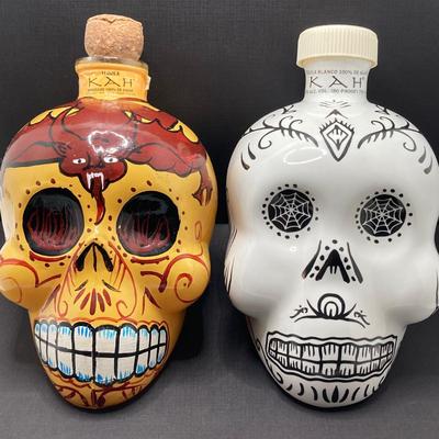 LOT 177: Pair of Kah Tequila Scull Bottles / Decanters, Set of Four Rocks Glasses and Glass Bottle with Wire Bail Swing Top Lid