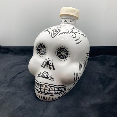 LOT 177: Pair of Kah Tequila Scull Bottles / Decanters, Set of Four Rocks Glasses and Glass Bottle with Wire Bail Swing Top Lid
