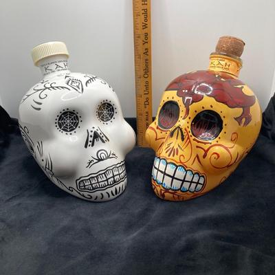LOT 177: Pair of Kah Tequila Scull Bottles / Decanters, Set of Four Rocks Glasses and Glass Bottle with Wire Bail Swing Top Lid