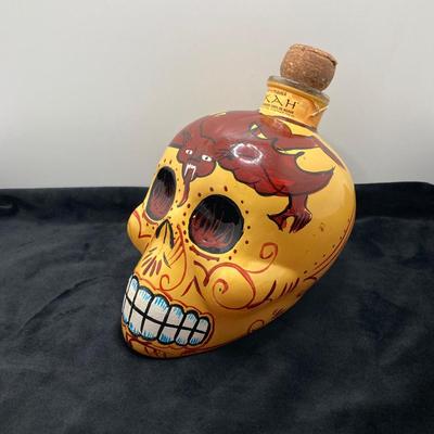 LOT 177: Pair of Kah Tequila Scull Bottles / Decanters, Set of Four Rocks Glasses and Glass Bottle with Wire Bail Swing Top Lid
