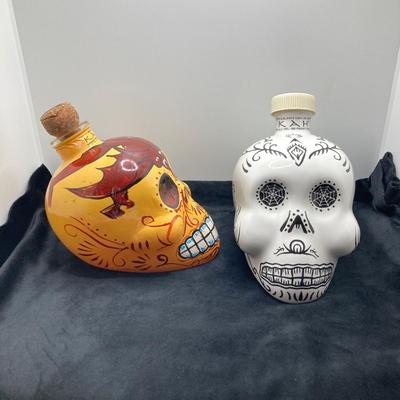 LOT 177: Pair of Kah Tequila Scull Bottles / Decanters, Set of Four Rocks Glasses and Glass Bottle with Wire Bail Swing Top Lid