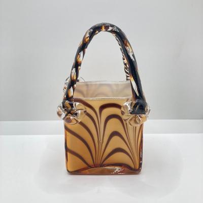LOT 178: Lenox Kate Spade One In A Million Mug, Art Glass Animal Print Handbag Vase, Leather Coach Hang Tag and Krispy Kreme Mug