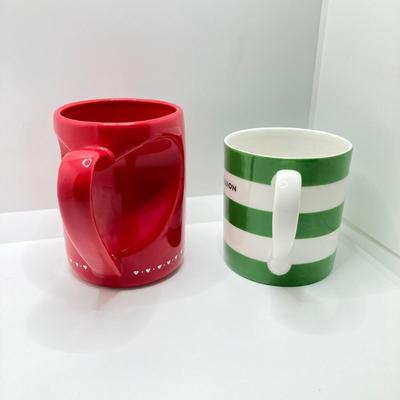 LOT 178: Lenox Kate Spade One In A Million Mug, Art Glass Animal Print Handbag Vase, Leather Coach Hang Tag and Krispy Kreme Mug