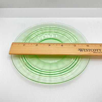 LOT 64: Ten 6 Inch Uranium Glass Serving Plates