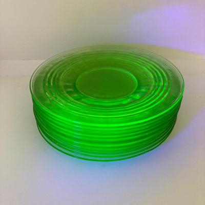 LOT 64: Ten 6 Inch Uranium Glass Serving Plates