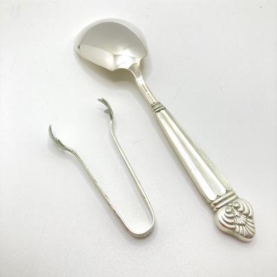 LOT 66: Gorham Sterling Silver Monogrammed Sugar Cube Tongs (25.2 gtw), Weighted Sterling / Stainless Knives, Serving Utensils and...