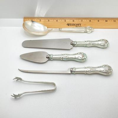 LOT 66: Gorham Sterling Silver Monogrammed Sugar Cube Tongs (25.2 gtw), Weighted Sterling / Stainless Knives, Serving Utensils and...