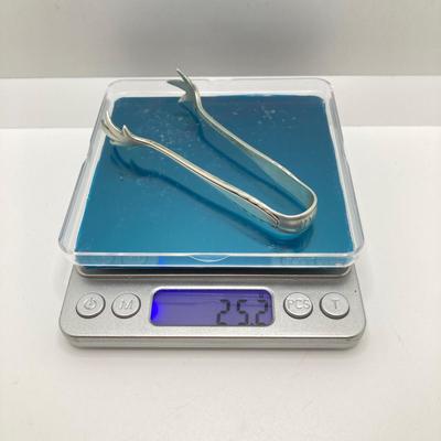 LOT 66: Gorham Sterling Silver Monogrammed Sugar Cube Tongs (25.2 gtw), Weighted Sterling / Stainless Knives, Serving Utensils and...