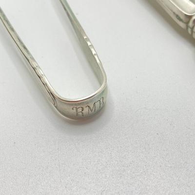 LOT 66: Gorham Sterling Silver Monogrammed Sugar Cube Tongs (25.2 gtw), Weighted Sterling / Stainless Knives, Serving Utensils and...