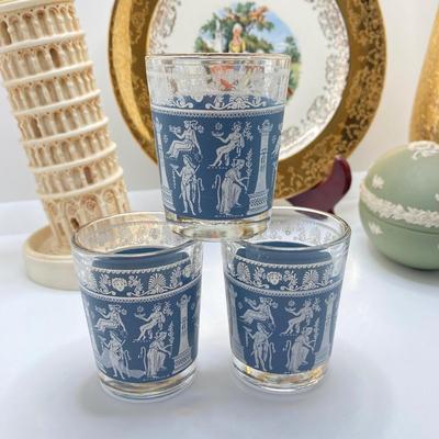 LOT 67: Collection of Home Decor - Gold Tone Vase, Sabin Crest-O-Gold 22K Souvenir New York, NY Plate, Leaning Tower of Pisa Candlestick...