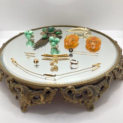 LOT 70: Vanity Mirror with Collection of Vintage Jewelry - Brooches / Pins, Shoe Clips, Clip-on Earrings, Adjustable Promise Ring and More