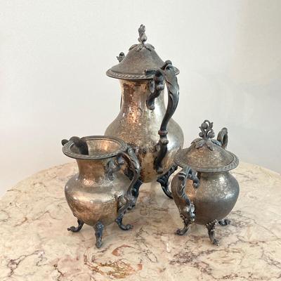 LOT 74: Silver Plate on Copper 4 Piece Tea Set