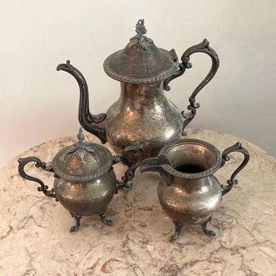 LOT 74: Silver Plate on Copper 4 Piece Tea Set