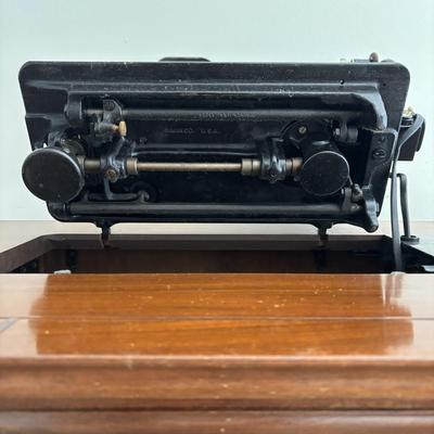 LOT 88: Vintage Singer Sewing Machine in Cabinet