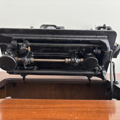 LOT 88: Vintage Singer Sewing Machine in Cabinet