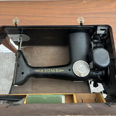 LOT 88: Vintage Singer Sewing Machine in Cabinet