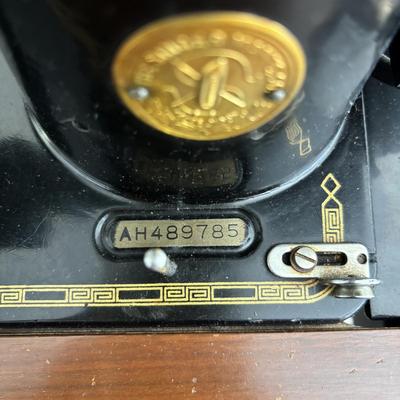 LOT 88: Vintage Singer Sewing Machine in Cabinet