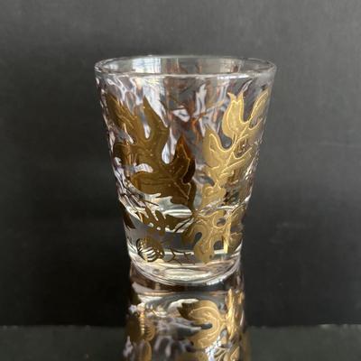 LOT 92: Sheffield Silve Plated Ice Bucket w/Lion Handles, Etched Pink Depressio Glasses (2), Etched Pilsner Glasses (3), MCM Gold Oak...