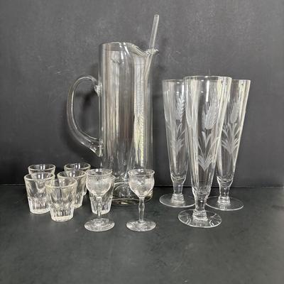LOT 92: Sheffield Silve Plated Ice Bucket w/Lion Handles, Etched Pink Depressio Glasses (2), Etched Pilsner Glasses (3), MCM Gold Oak...