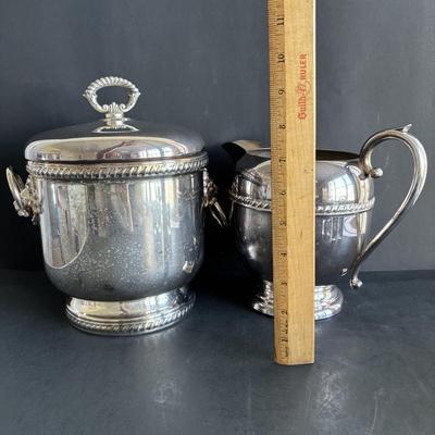 LOT 92: Sheffield Silve Plated Ice Bucket w/Lion Handles, Etched Pink Depressio Glasses (2), Etched Pilsner Glasses (3), MCM Gold Oak...